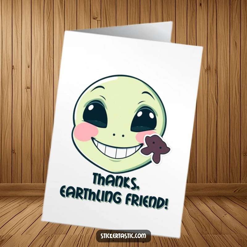 Funny Free Printable Alien Thank You card with a grinning alien face and a sticker on its cheek, perfect for DIY gifts.